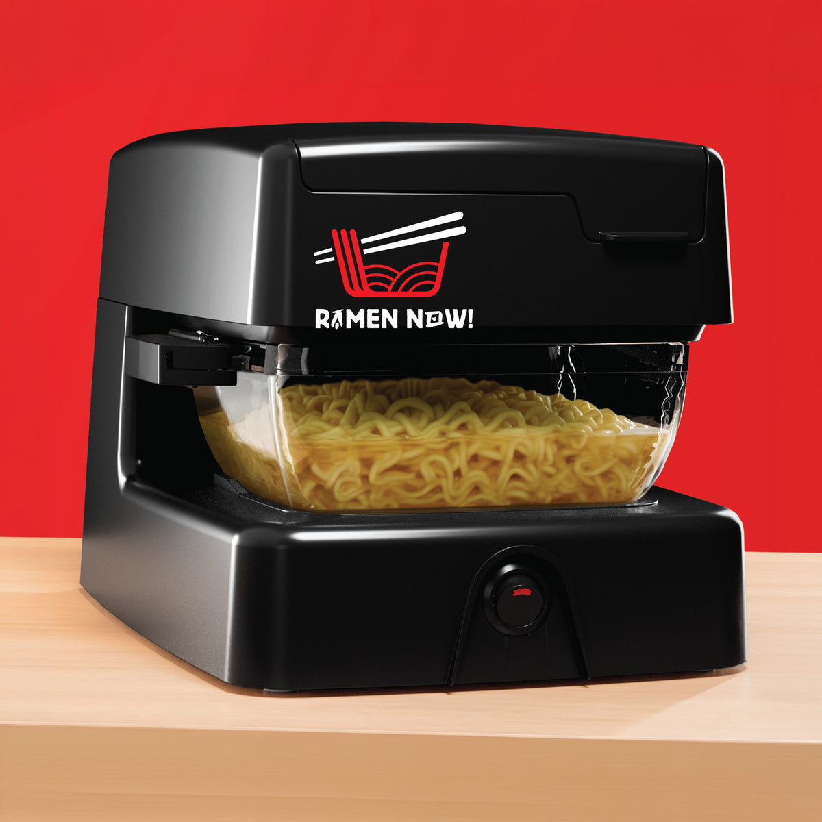 유리그릇에 담긴 라면을 조리하는 Ramen Now 책상용 조리기